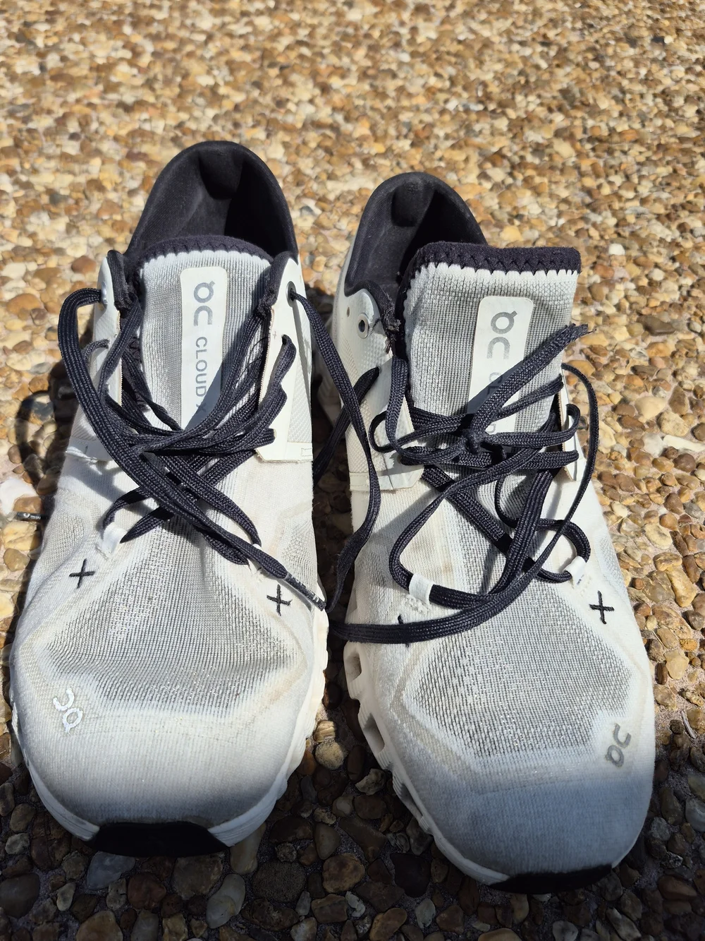 On Running Men’s Cloud Athletic Sneakers in White and Black